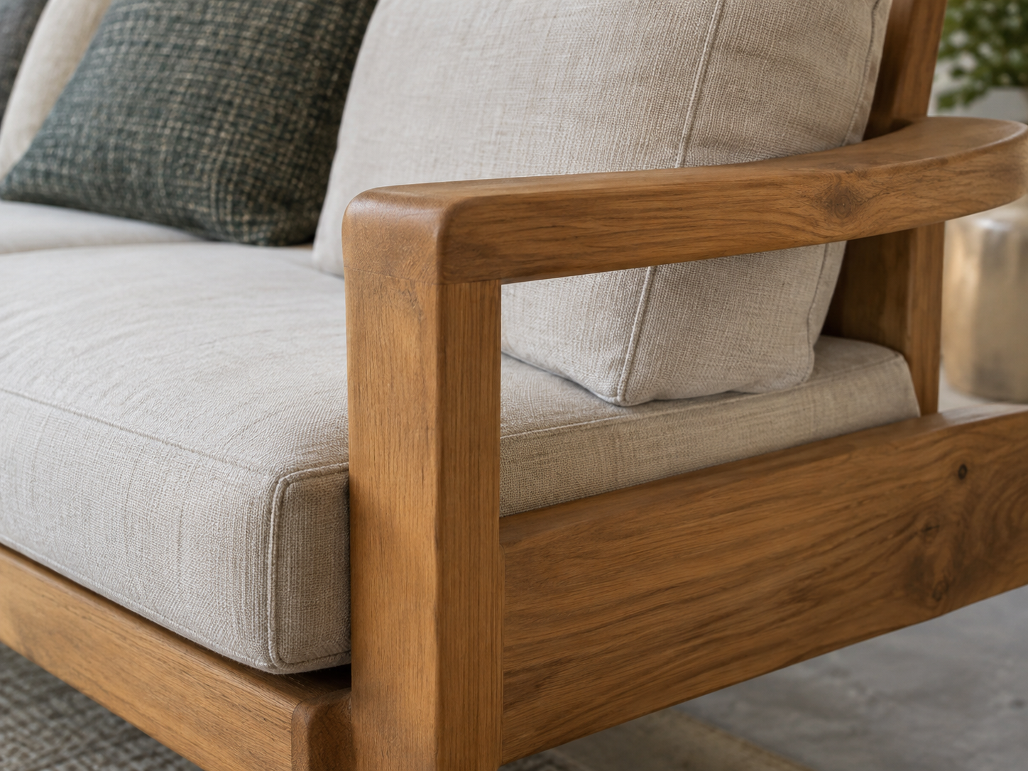 close up of teak sofa with cushions and wood grain